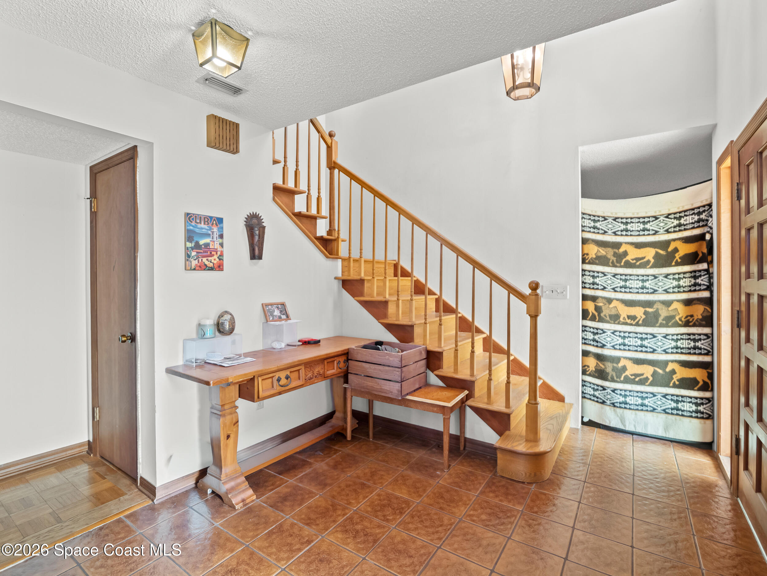 1190 Shady Lane Merritt Island, FL 32952 - Photo 3 of 35 a view of front door with entryway