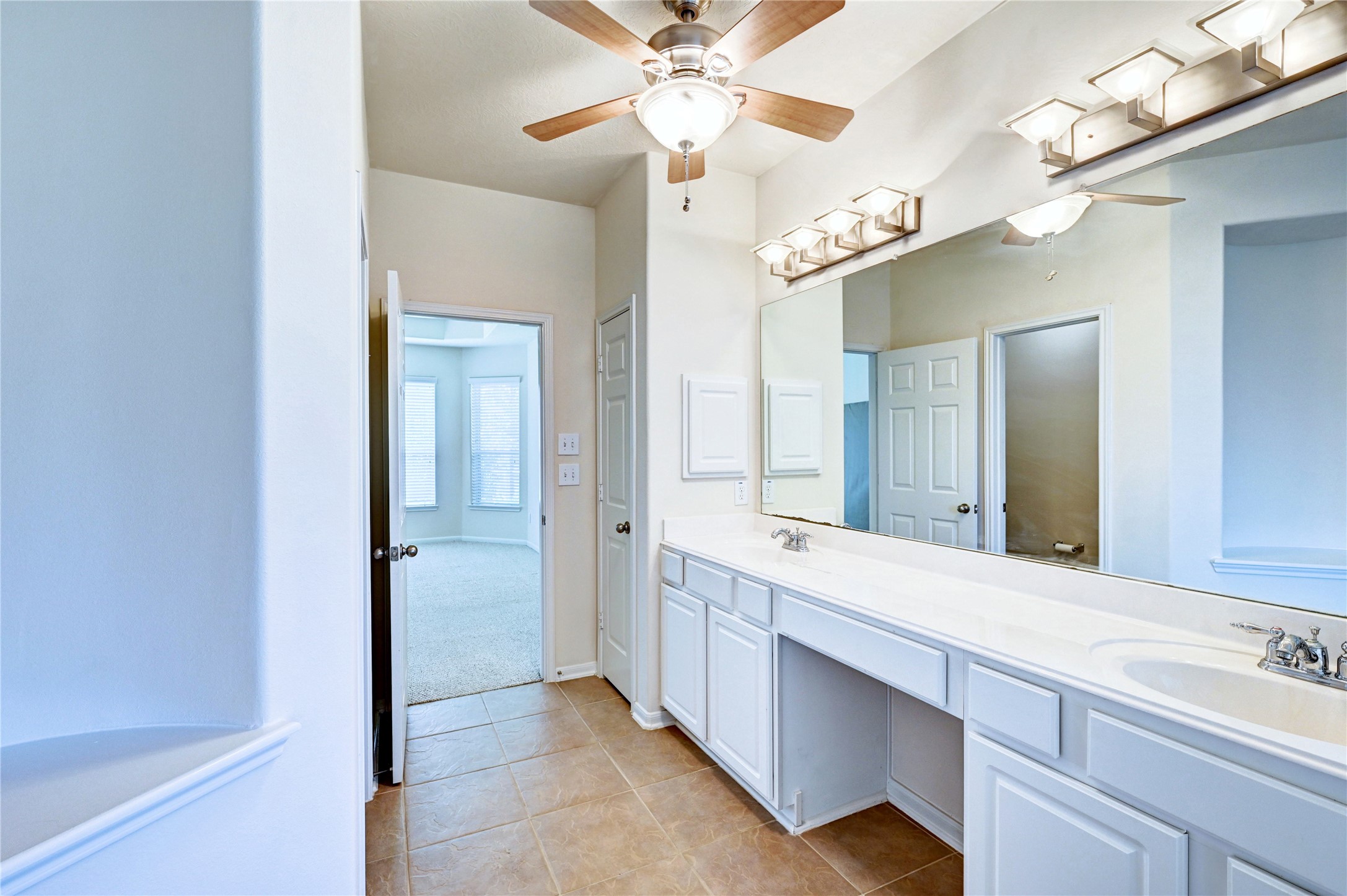 24818 Corbin Gate Drive Spring, TX 77389 - Photo 16 of 49 The double sinks and Vanity area