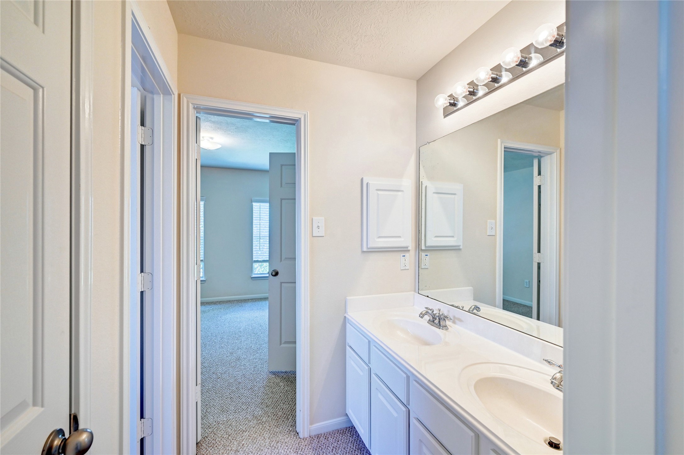 24818 Corbin Gate Drive Spring, TX 77389 - Photo 37 of 49 Hollywood bathroom 2 sinks