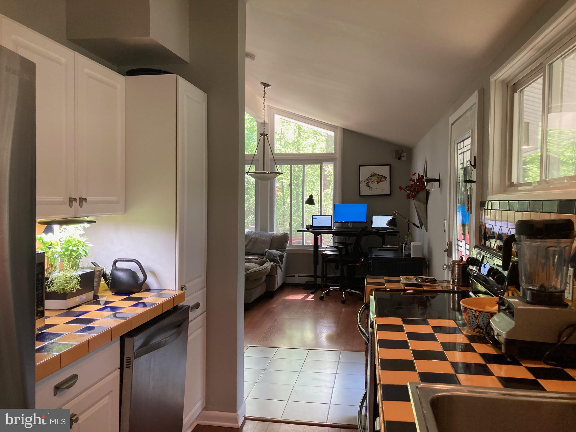 5 Holly Lane Malvern, PA 19355 - Photo 9 of 51 Hip tiles brighten Kitchen