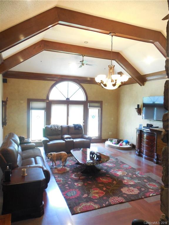 930 Shive Road Salisbury, NC 28146 - Photo 11 of 36 a living room with furniture and a large window