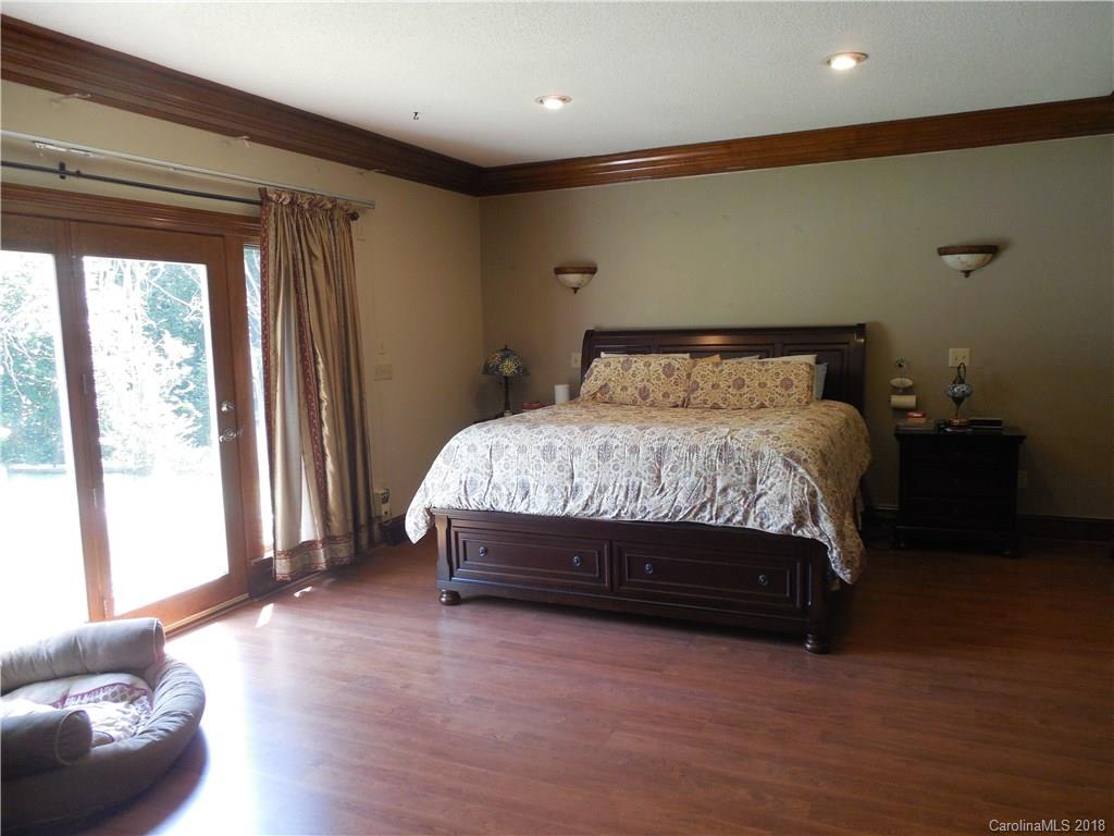 930 Shive Road Salisbury, NC 28146 - Photo 22 of 36 a bedroom with a bed and window