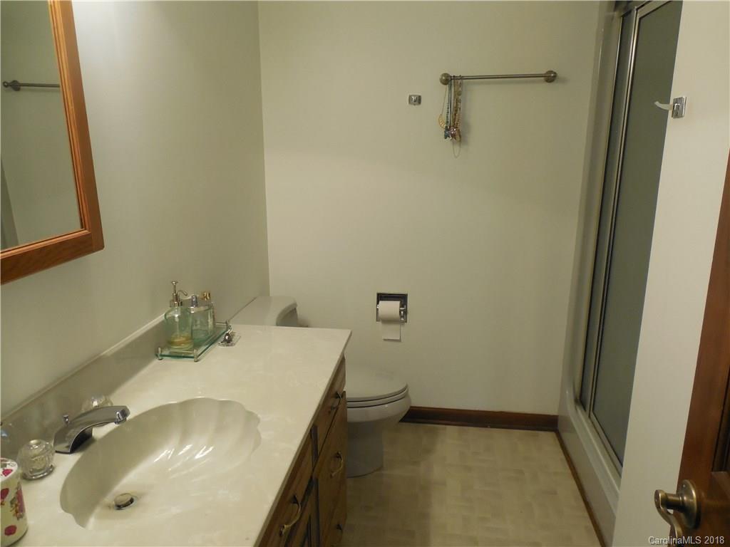 930 Shive Road Salisbury, NC 28146 - Photo 26 of 36 a bathroom with a sink and tub