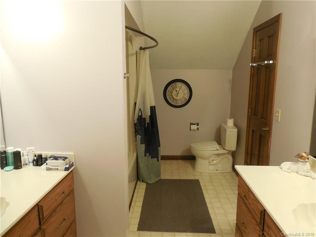 930 Shive Road Salisbury, NC 28146 - Photo 28 of 36 a view of a bathroom with a sink and a toilet