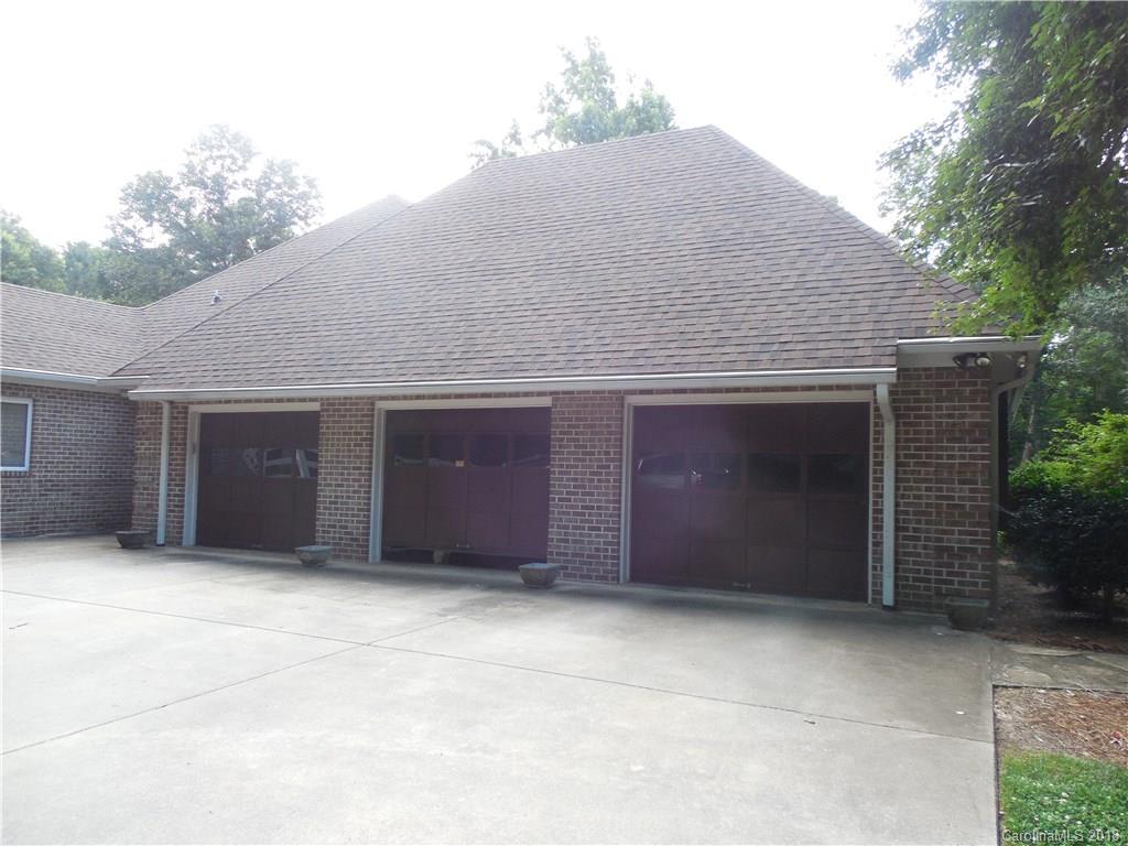 930 Shive Road Salisbury, NC 28146 - Photo 33 of 36 a front view of a house with a garage