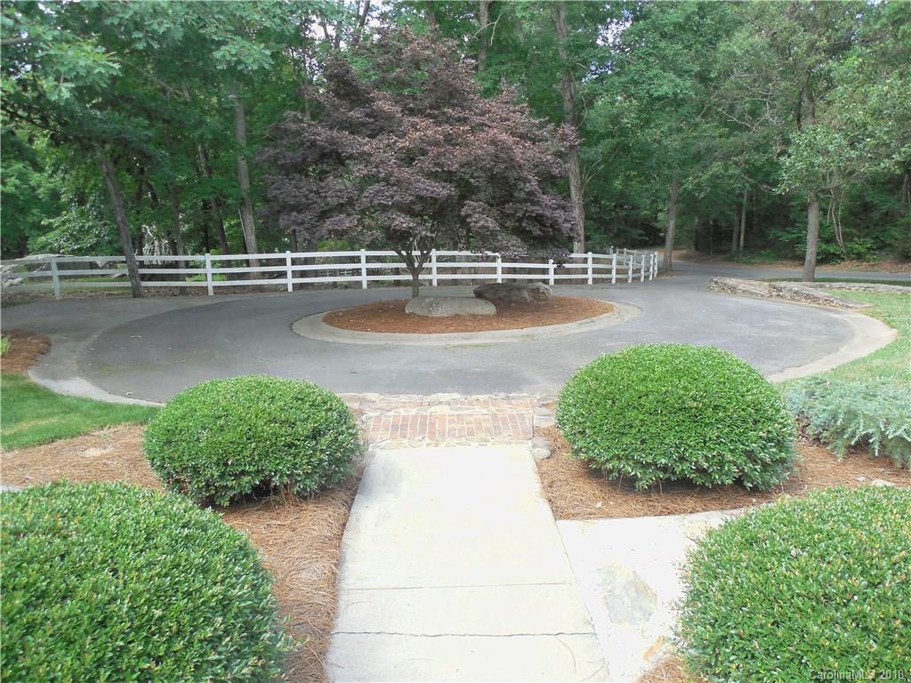 930 Shive Road Salisbury, NC 28146 - Photo 5 of 36 a view of a swimming pool with a yard