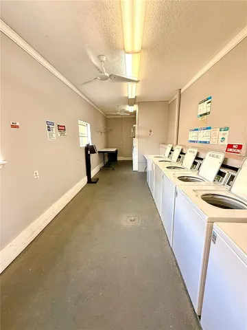 a kitchen that has a sink and a stove