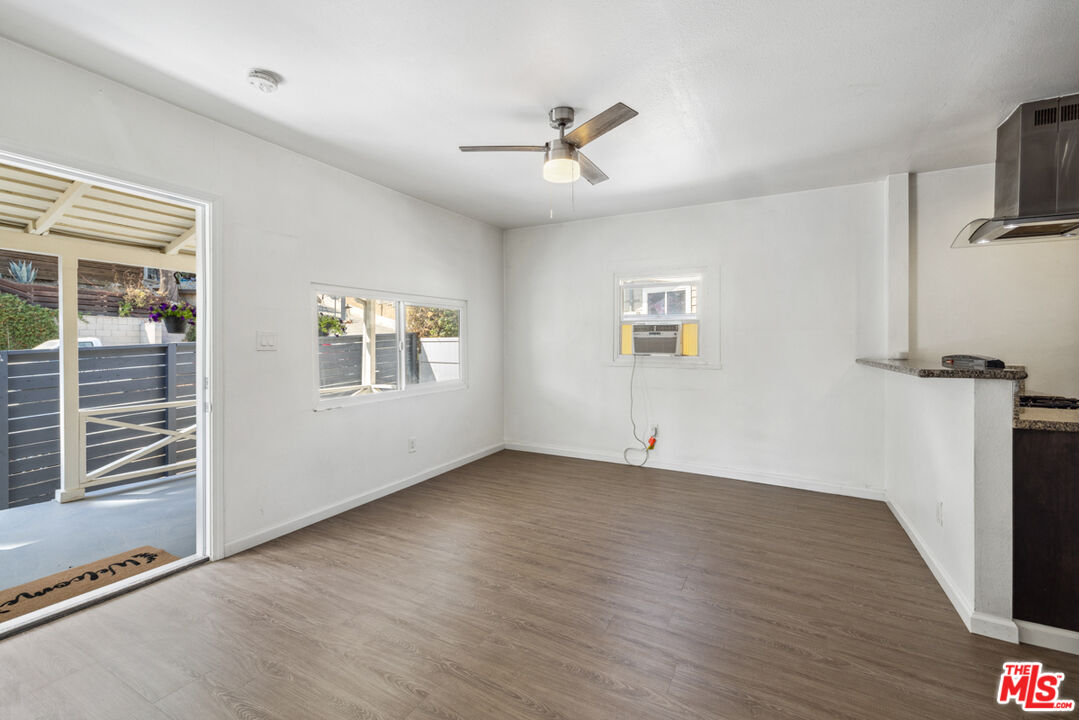 3110 Pyrites Street Los Angeles, CA 90032 - Photo 11 of 30 a view of an empty room with a window and wooden floor
