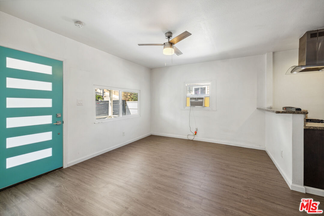 3110 Pyrites Street Los Angeles, CA 90032 - Photo 10 of 30 a view of an empty room with a window and wooden floor