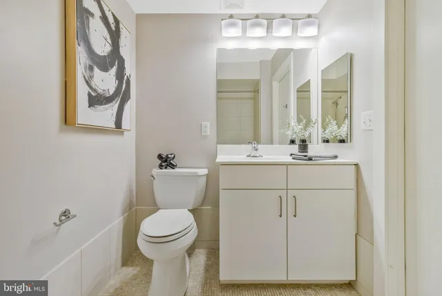 a bedroom with a bed and a table