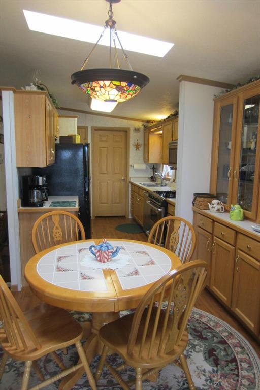65 Pit Road Phippsburg, ME 04562 - Photo 9 of 35 Dining room and kitchen.