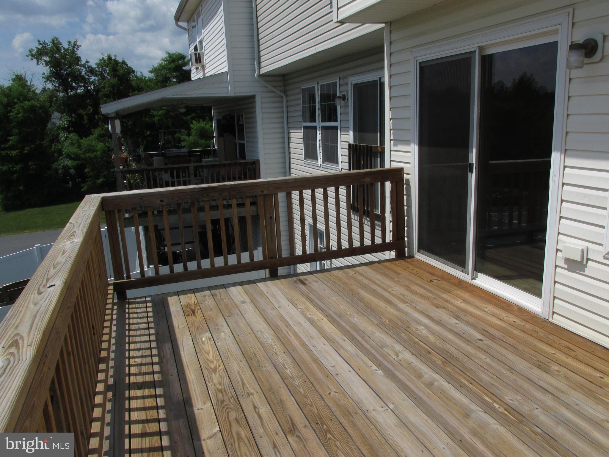 192 Rumbling Rock Road Hedgesville, WV 25427 - Photo 13 of 27 Rear deck from the kitchen