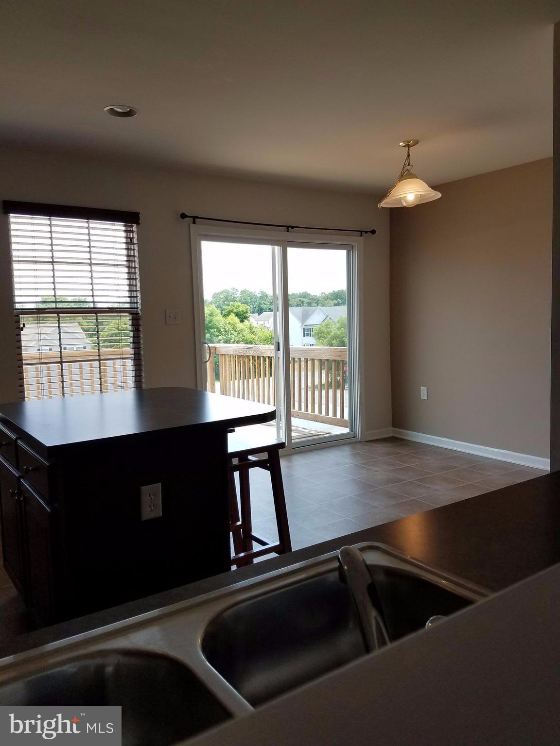 192 Rumbling Rock Road Hedgesville, WV 25427 - Photo 21 of 27 Breakfast Area, Sliding glass door to large deck.