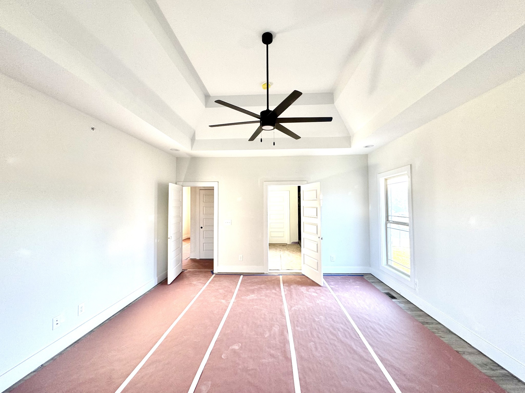 406 Young Lane Pleasant View, TN 37146 - Photo 23 of 60 a view of a room with a ceiling fan and window