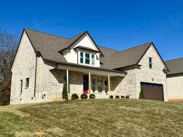 a kitchen with refrigerator and window