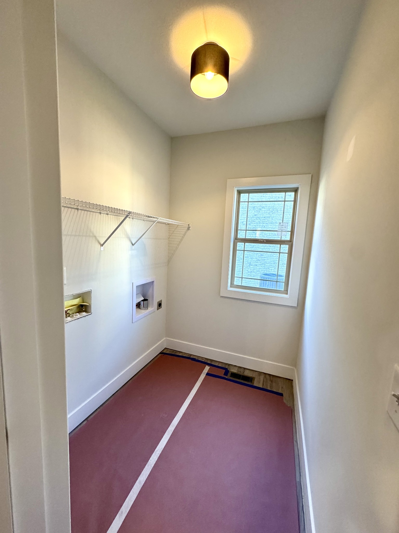 406 Young Lane Pleasant View, TN 37146 - Photo 51 of 60 an empty room with ceiling fan and windows