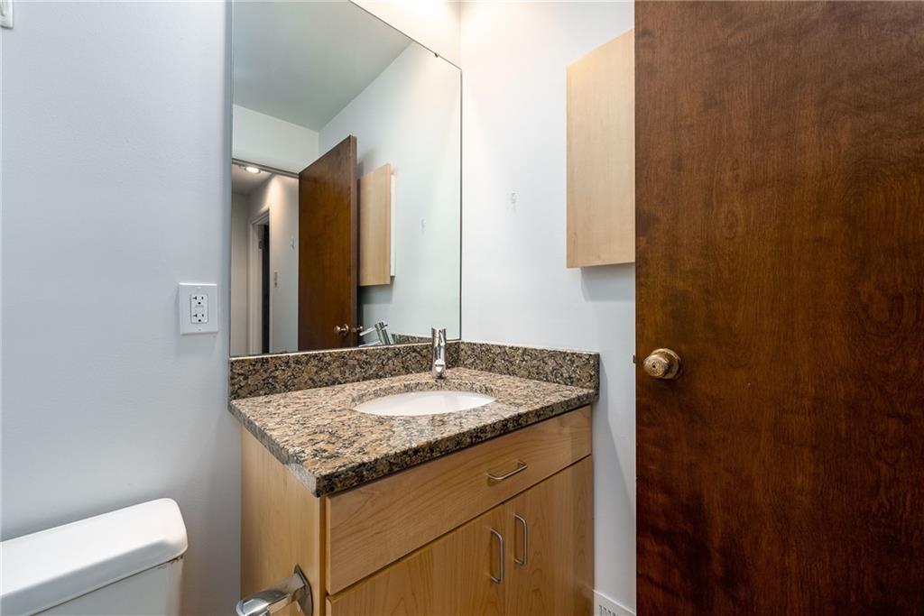 124 Berwyn Road Pittsburgh, PA 15237 - Photo 22 of 25 a bathroom with a granite countertop sink and a mirror