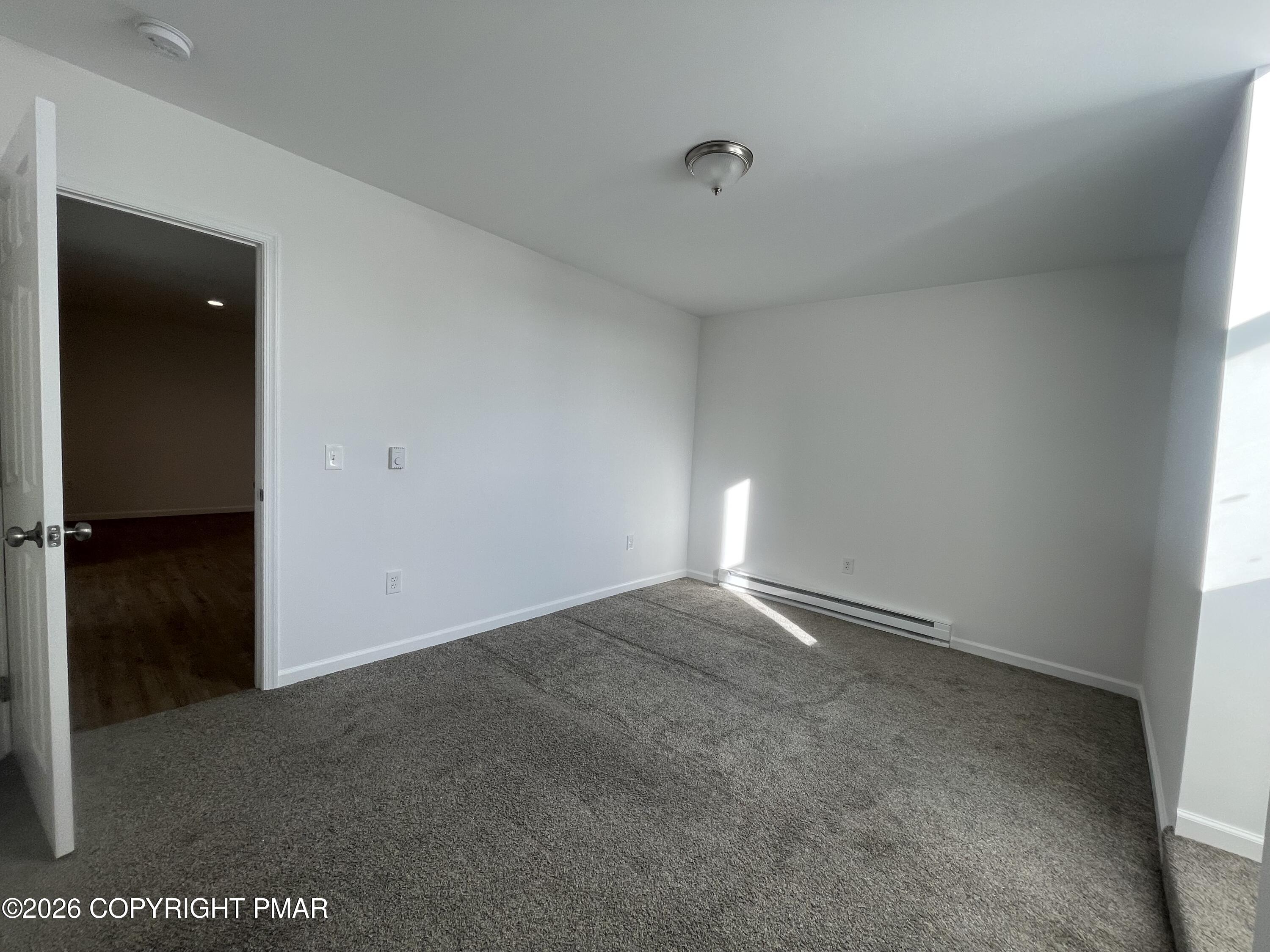 548 Main Street, Unit 6B Stroudsburg, PA 18360 - Photo 13 of 16 an empty room with closet