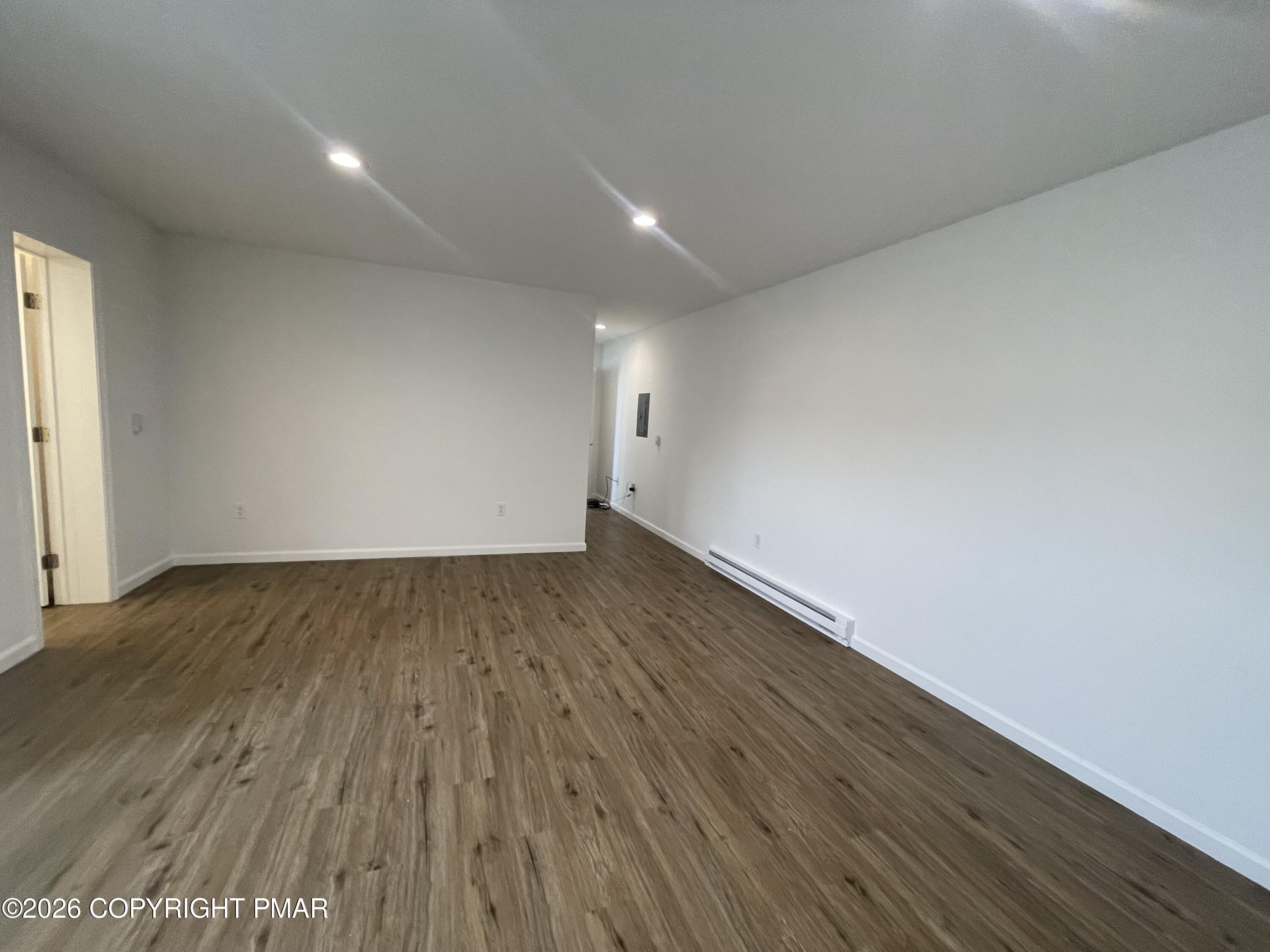 548 Main Street, Unit 6B Stroudsburg, PA 18360 - Photo 15 of 16 a view of wooden floor and staircase in a room