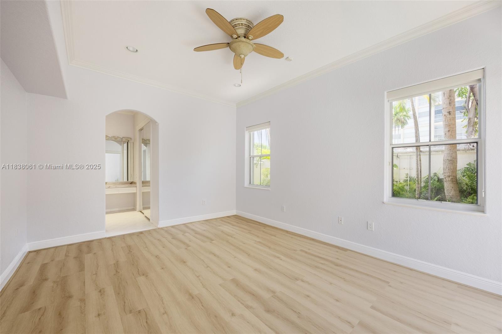 1571 Breakwater Terrace Hollywood, FL 33019 - Photo 15 of 42 wooden floor in an empty room with a window