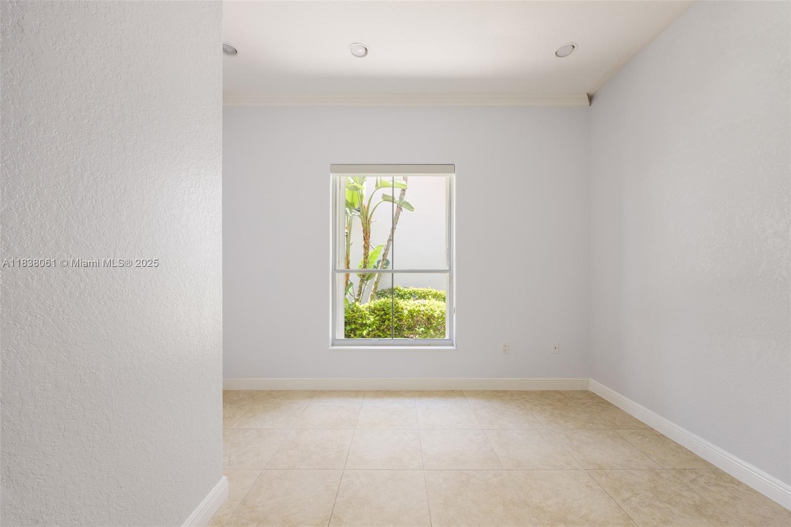 1571 Breakwater Terrace Hollywood, FL 33019 - Photo 21 of 42 an empty room with a window