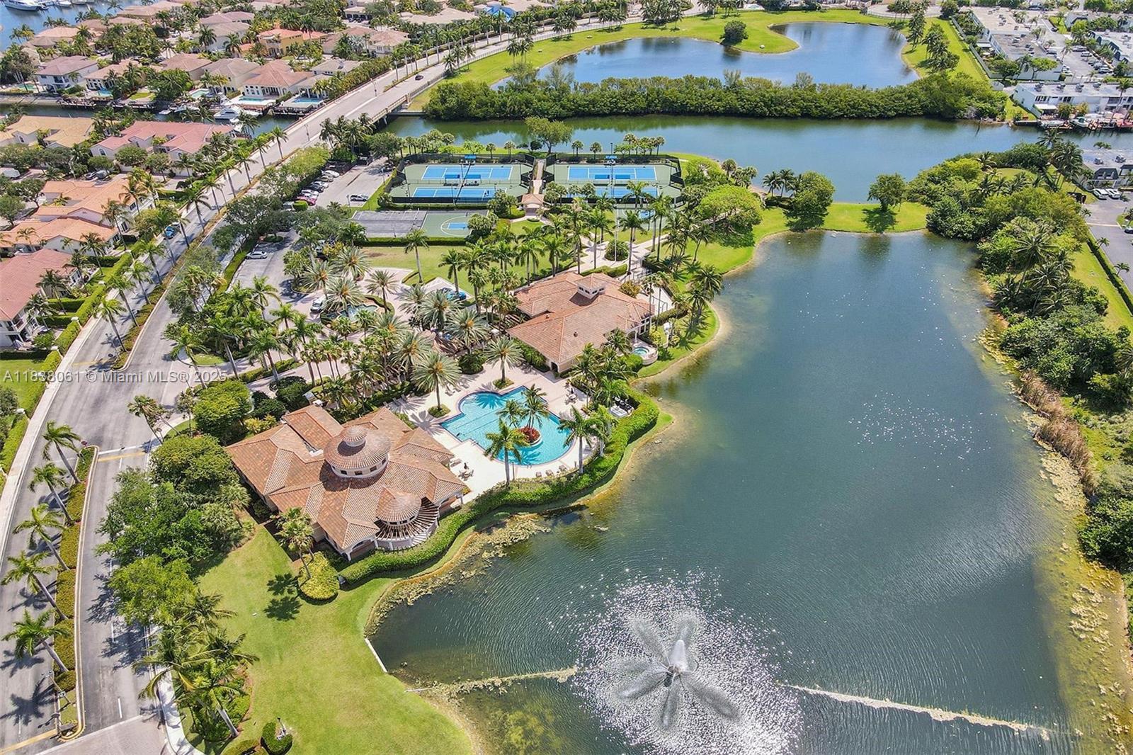 1571 Breakwater Terrace Hollywood, FL 33019 - Photo 35 of 42 an aerial view of a house with a yard and lake view