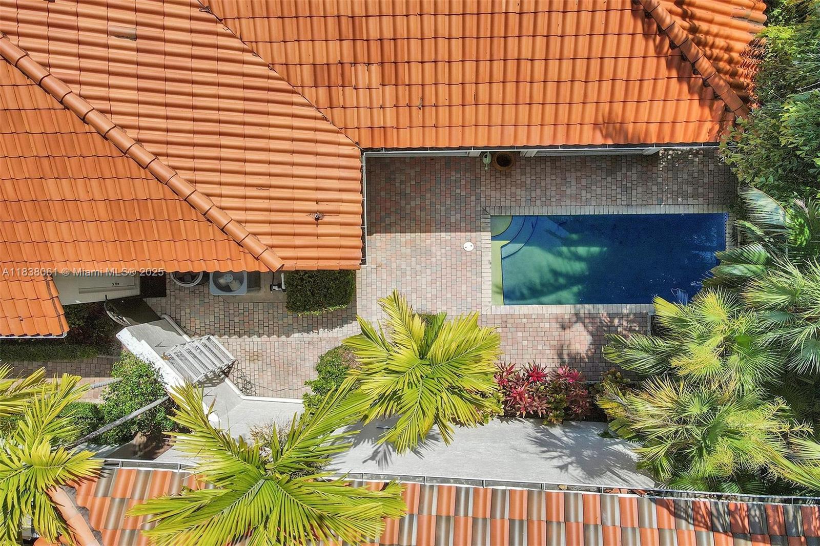 1571 Breakwater Terrace Hollywood, FL 33019 - Photo 39 of 42 a view of a house with a patio