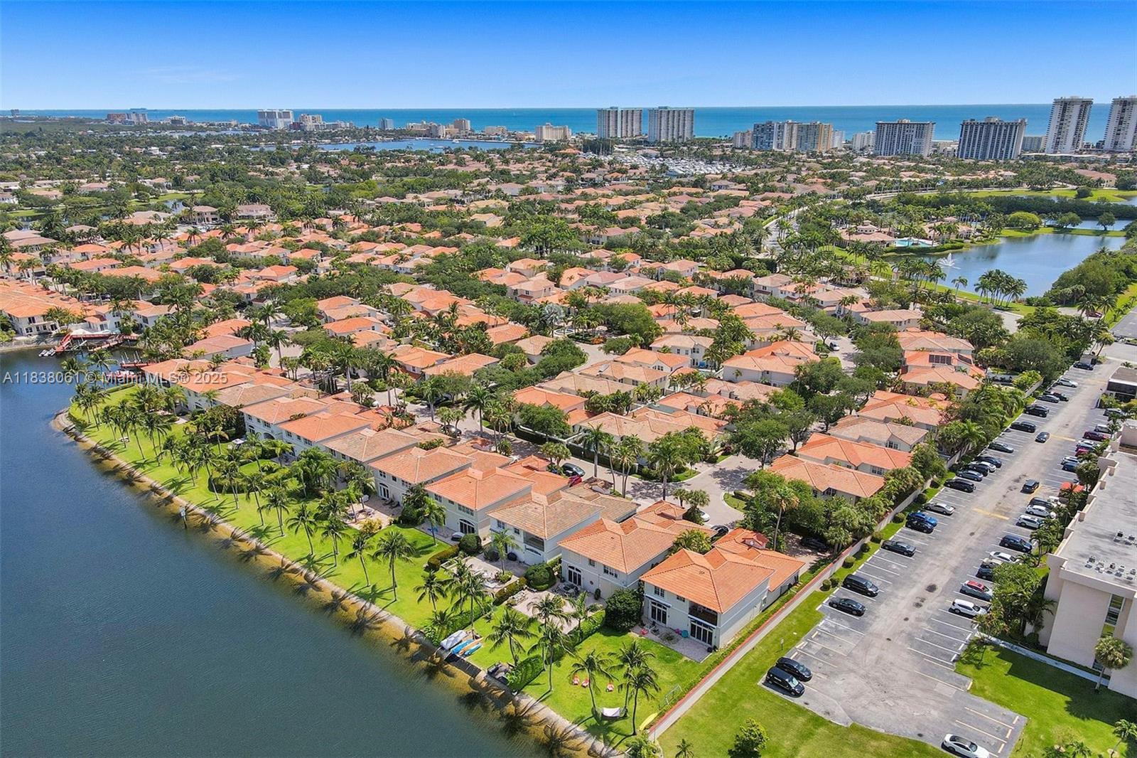 1571 Breakwater Terrace Hollywood, FL 33019 - Photo 40 of 42 an aerial view of residential houses with outdoor space and trees