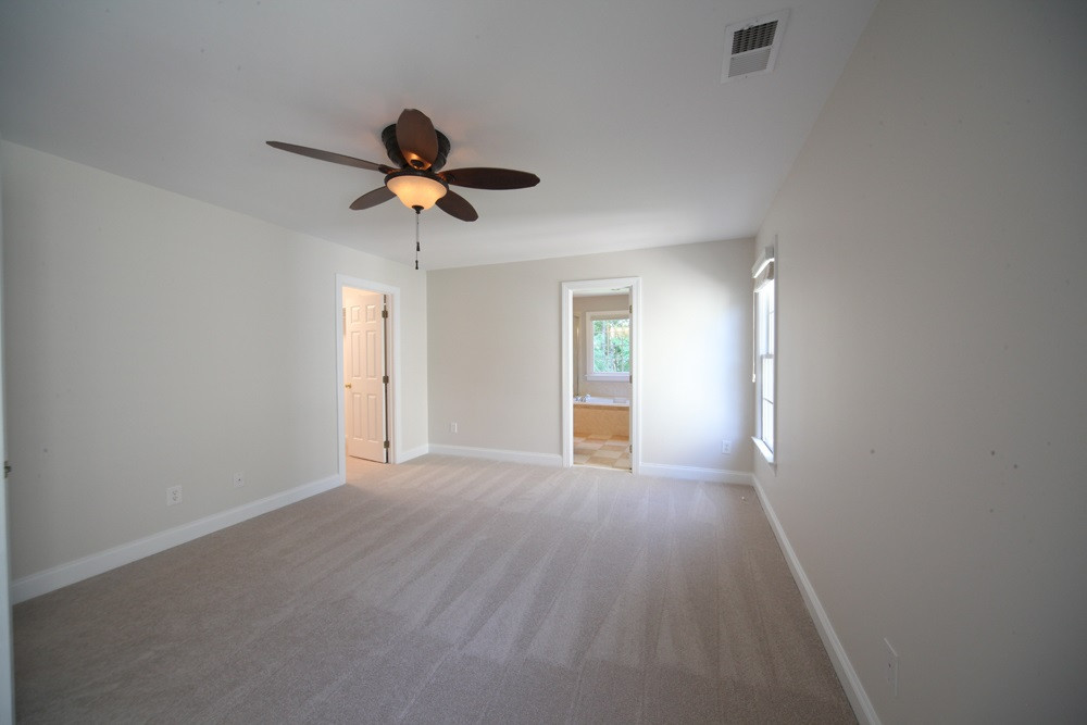 104 Rushing Wind Way Apex, NC 27502 - Photo 16 of 25 Master Bedroom