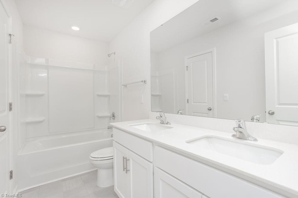 185 Pepper Tree Road Stokesdale, NC 27357 - Photo 28 of 30 The home model is a representative of its residential design