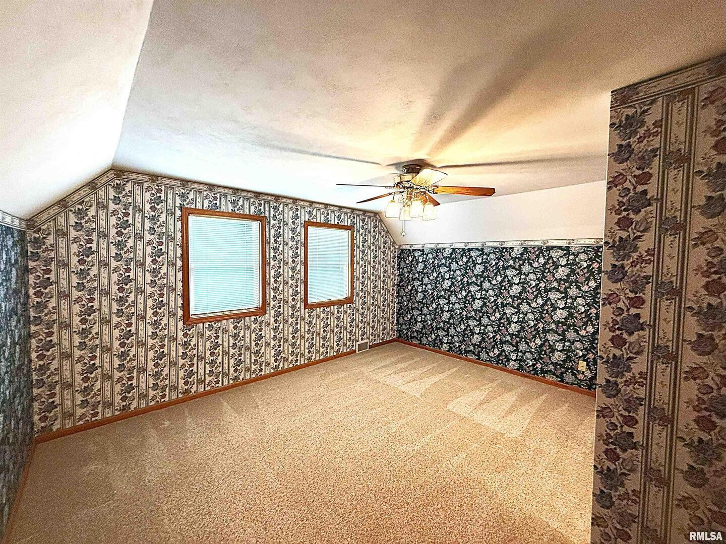 330 North Main Street Walcott, IA 52773 - Photo 21 of 39 a view of a livingroom