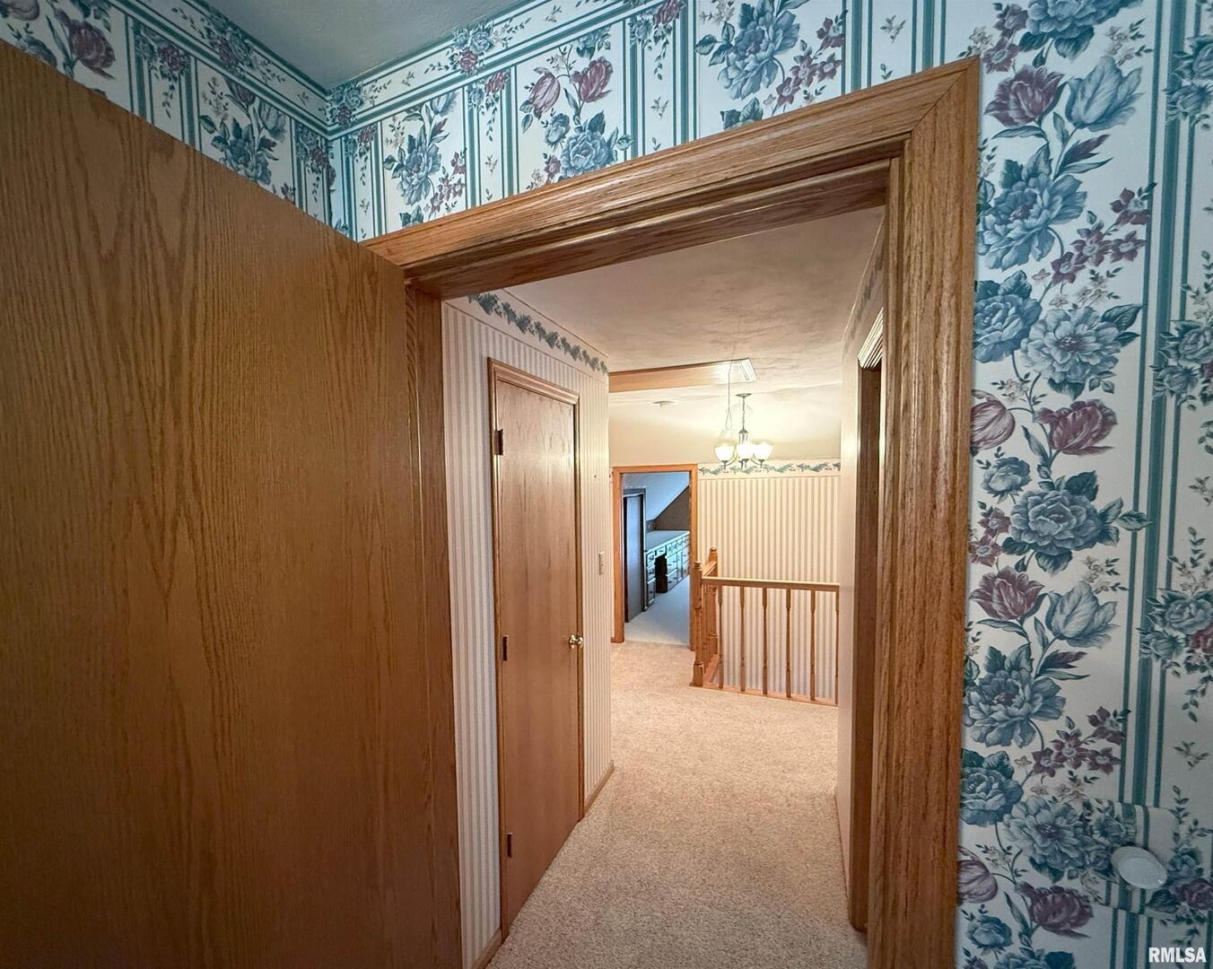 330 North Main Street Walcott, IA 52773 - Photo 23 of 39 a view of a hallway with a hallway
