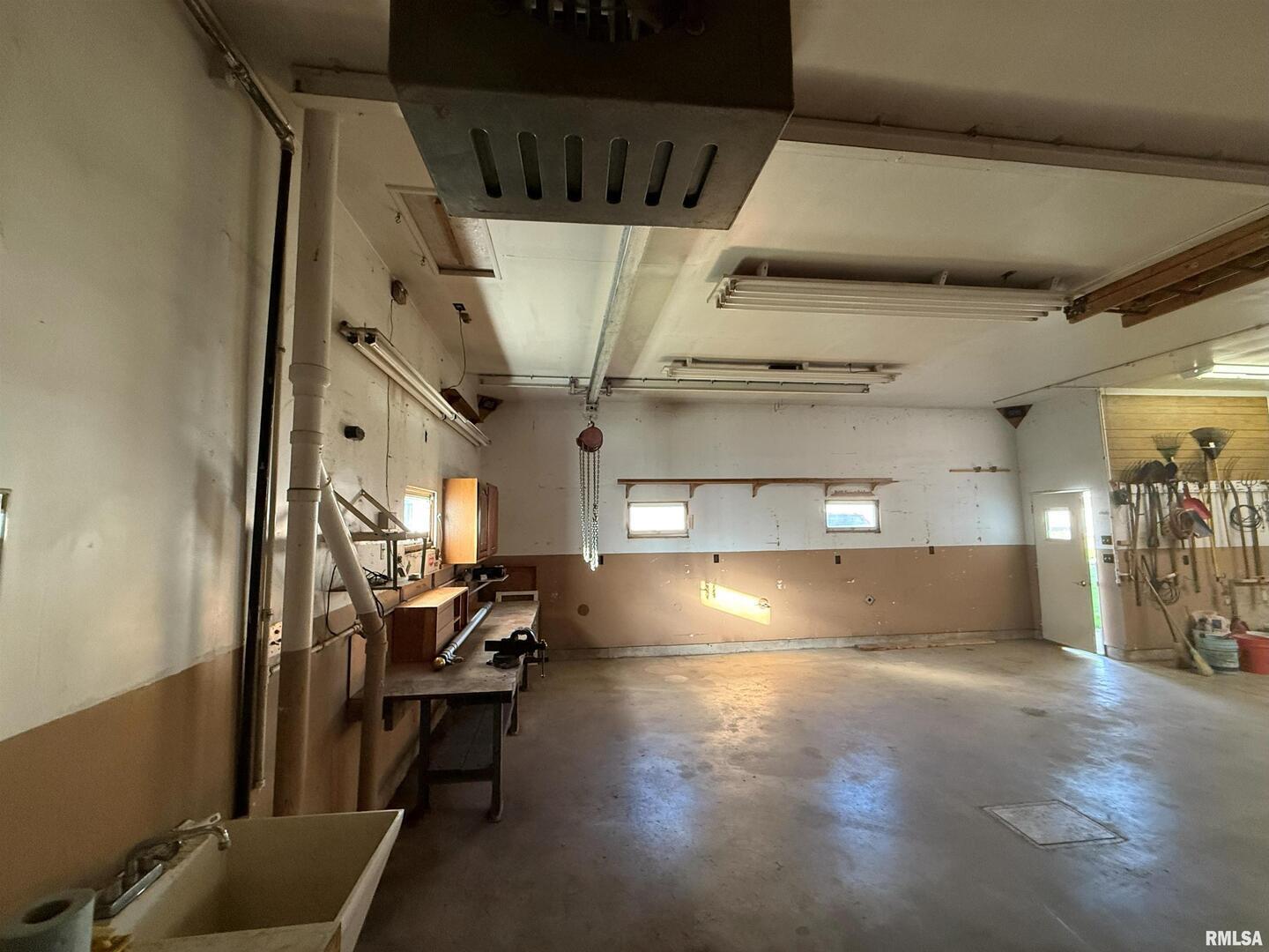 330 North Main Street Walcott, IA 52773 - Photo 37 of 39 a view of gym equipment and living room