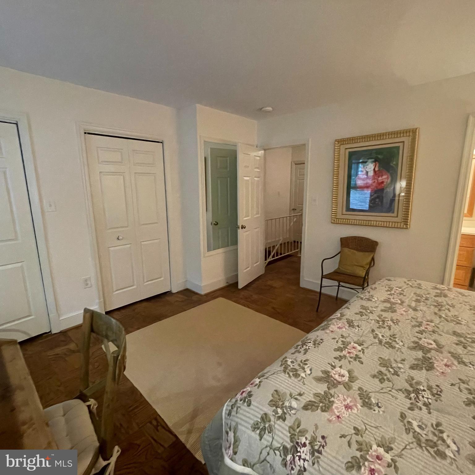 3221 Sutton Place Northwest, Unit B Washington, DC 20016 - Photo 14 of 22 a bedroom with a bed and a couch