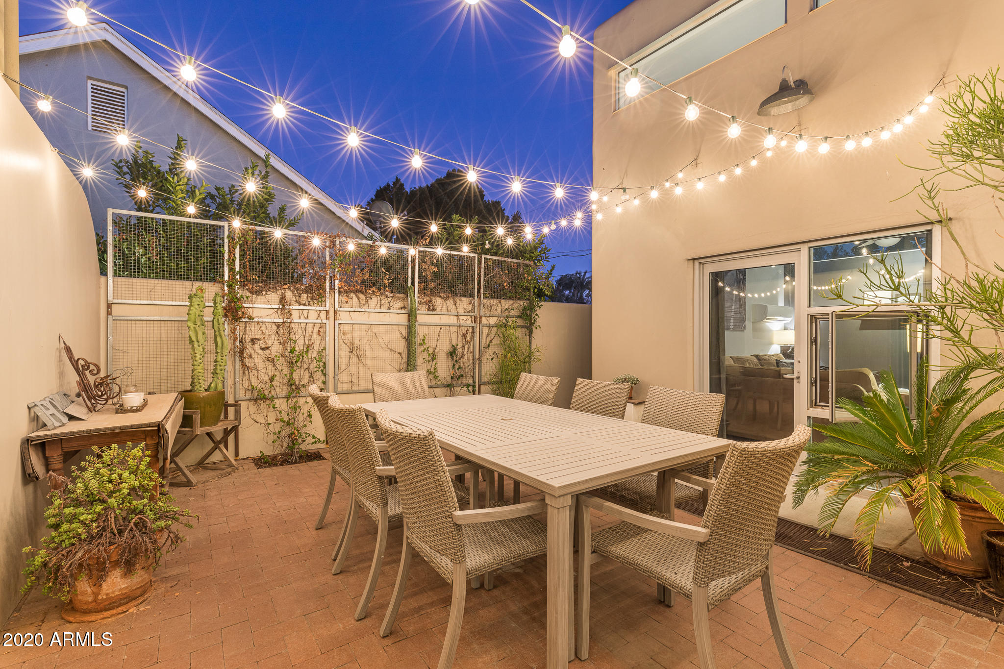 1541 East Cheery Lynn Road Phoenix, AZ 85014 - Photo 32 of 46 Hardwired bistro lights in courtyard