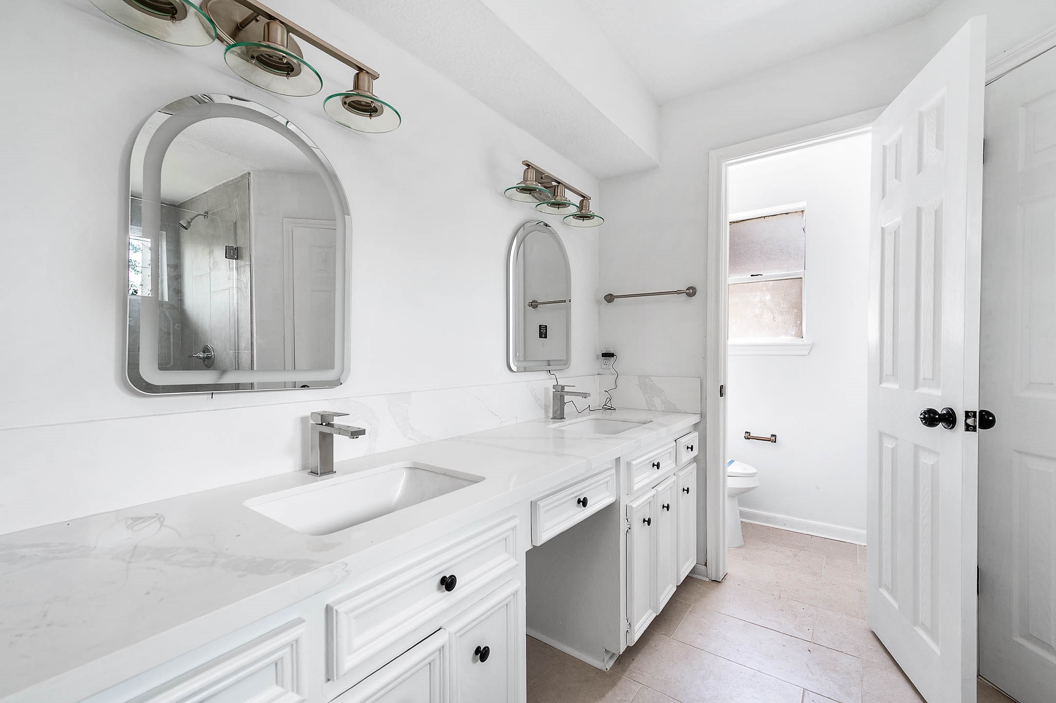 17627 Terrawren Lane Spring, TX 77379 - Photo 22 of 30 a spacious bathroom with a double vanity sink mirror and
