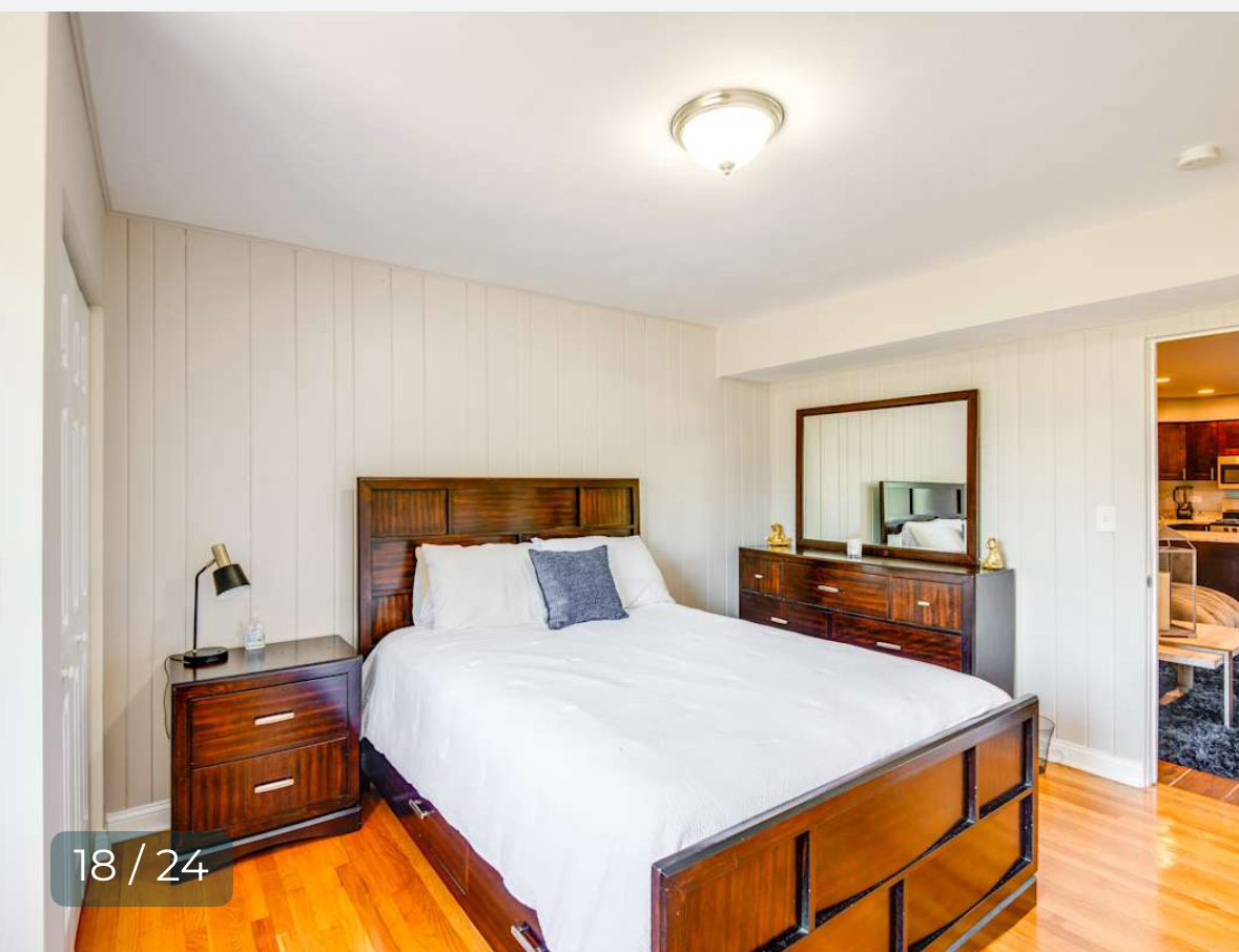 8136 South Kedzie Avenue, Unit 202 Chicago, IL 60652 - Photo 16 of 17 a bedroom with a bed and a lamp on dresser