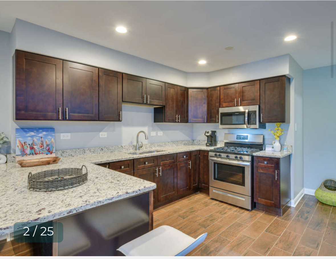 8136 South Kedzie Avenue, Unit 202 Chicago, IL 60652 - Photo 9 of 17 a kitchen with stainless steel appliances granite countertop a sink stove and refrigerator