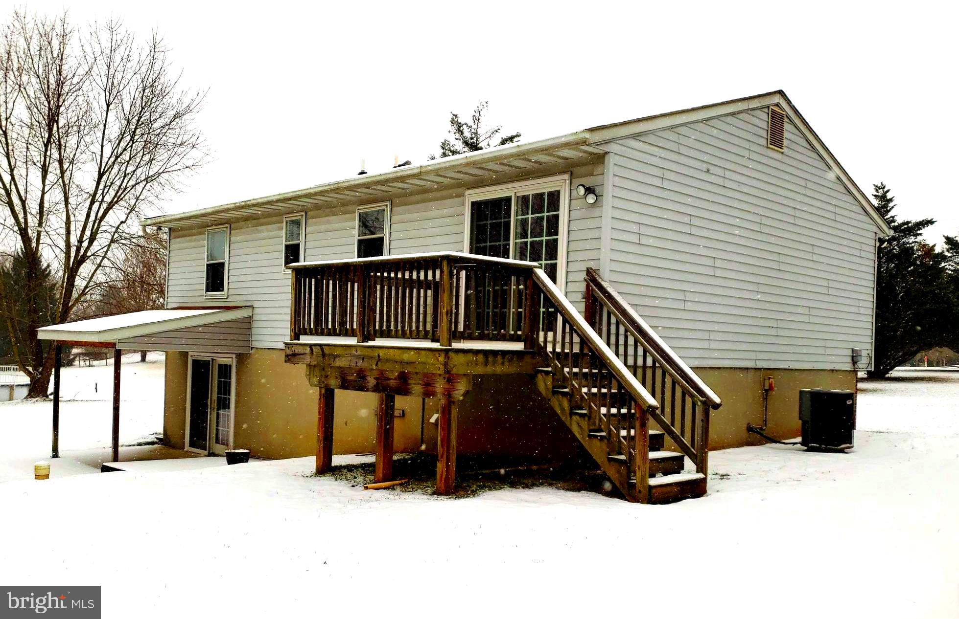 2022 Suffolk Road Finksburg, MD 21048 - Photo 2 of 19 a front view of a house with garage