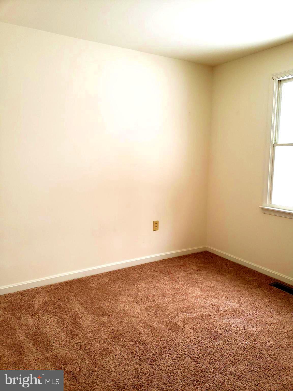 2022 Suffolk Road Finksburg, MD 21048 - Photo 13 of 19 an empty room with a window