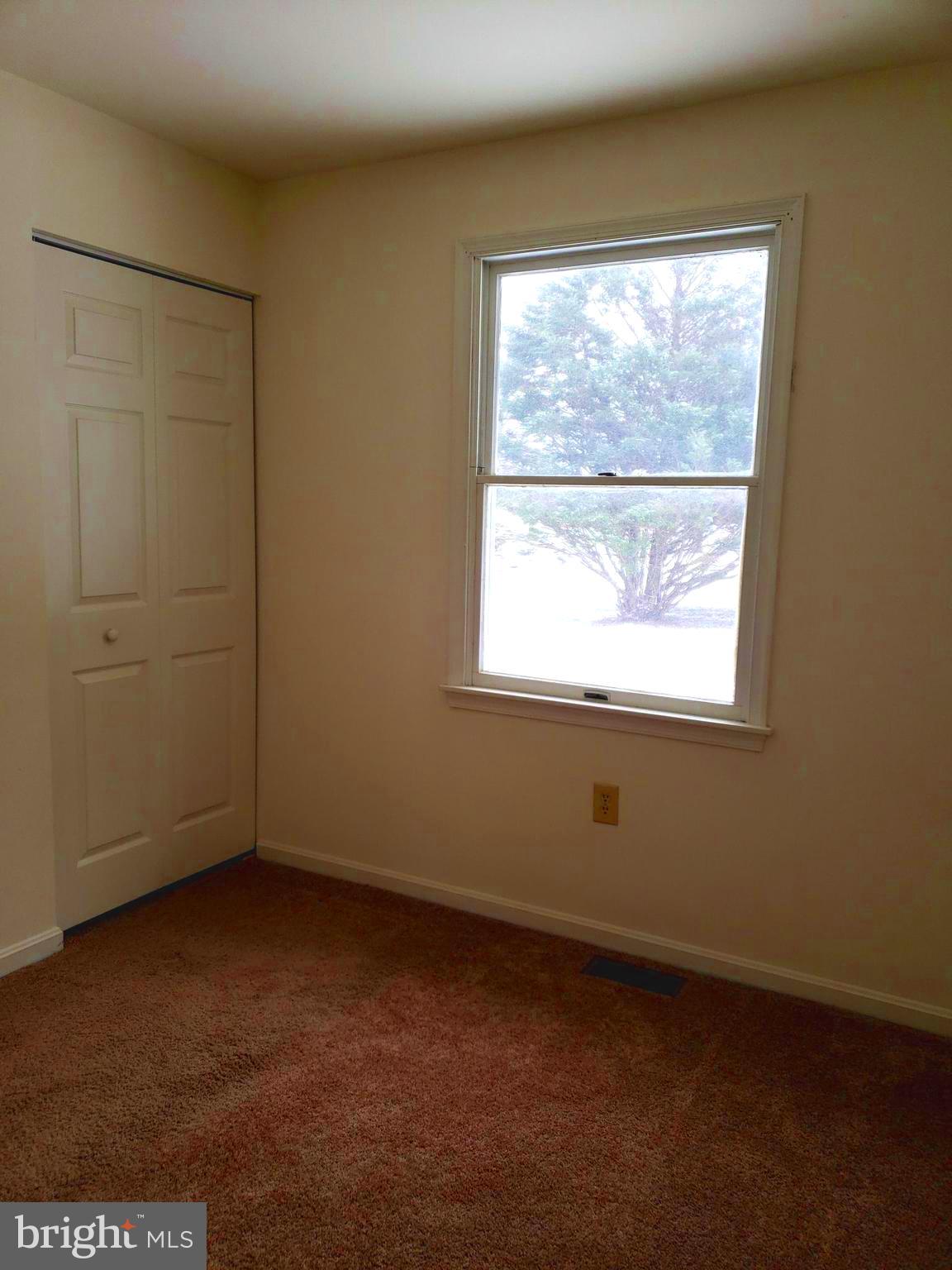 2022 Suffolk Road Finksburg, MD 21048 - Photo 14 of 19 an empty room with a window