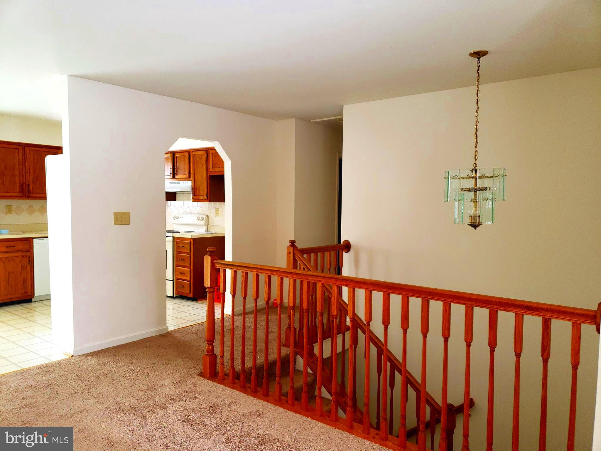 2022 Suffolk Road Finksburg, MD 21048 - Photo 6 of 19 a view of a hallway with windows