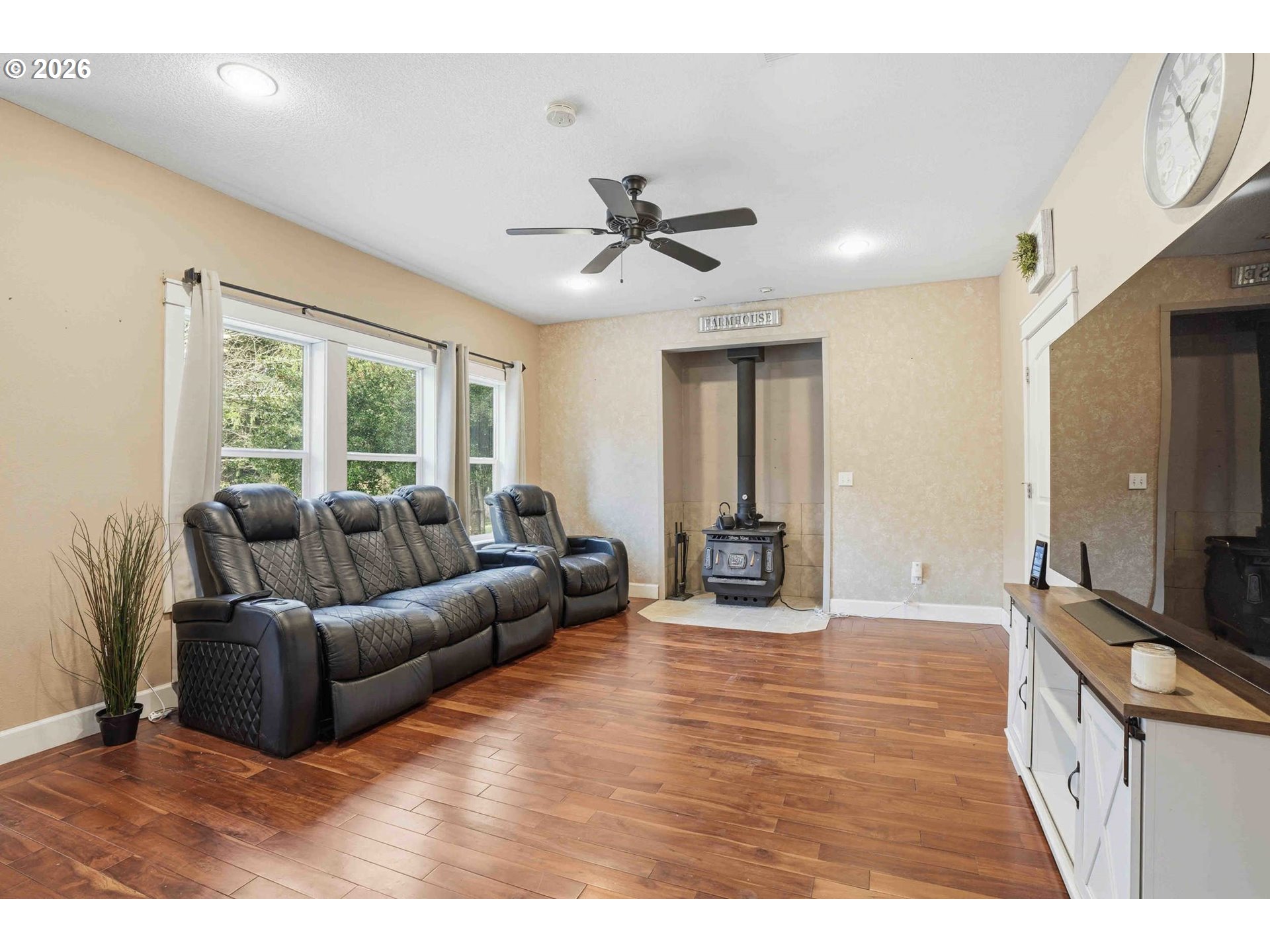 4204 Northeast Cardiel Road Washougal, WA 98671 - Photo 15 of 42 a living room with furniture and a flat screen tv
