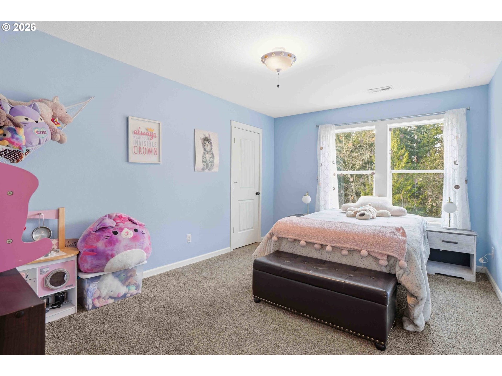 4204 Northeast Cardiel Road Washougal, WA 98671 - Photo 18 of 42 a bedroom with a bed and a window