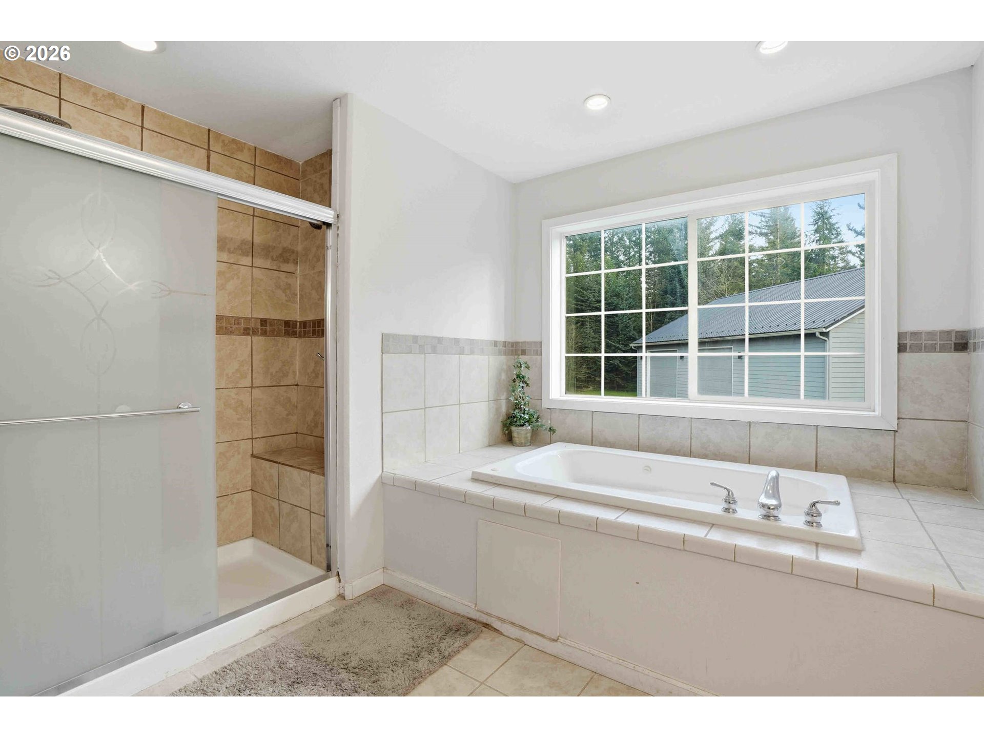 4204 Northeast Cardiel Road Washougal, WA 98671 - Photo 26 of 42 a bathroom with a bathtub and a sink
