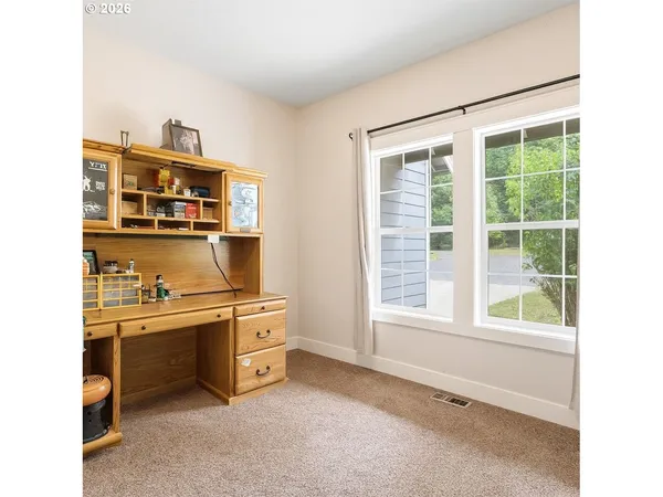 a kitchen with a stove and a cabinet