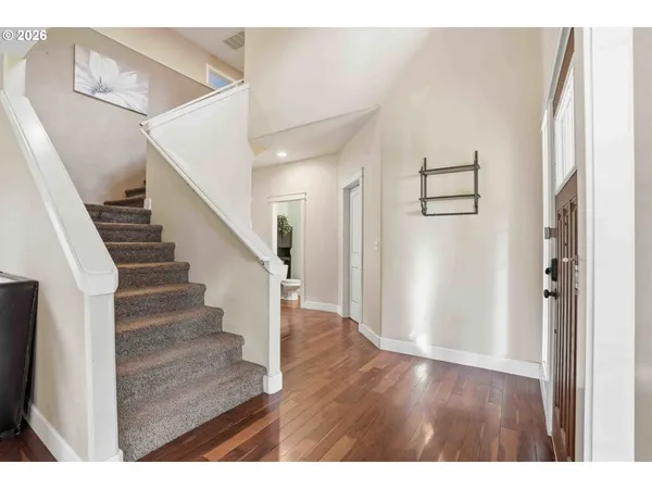 a view of entryway with wooden floor