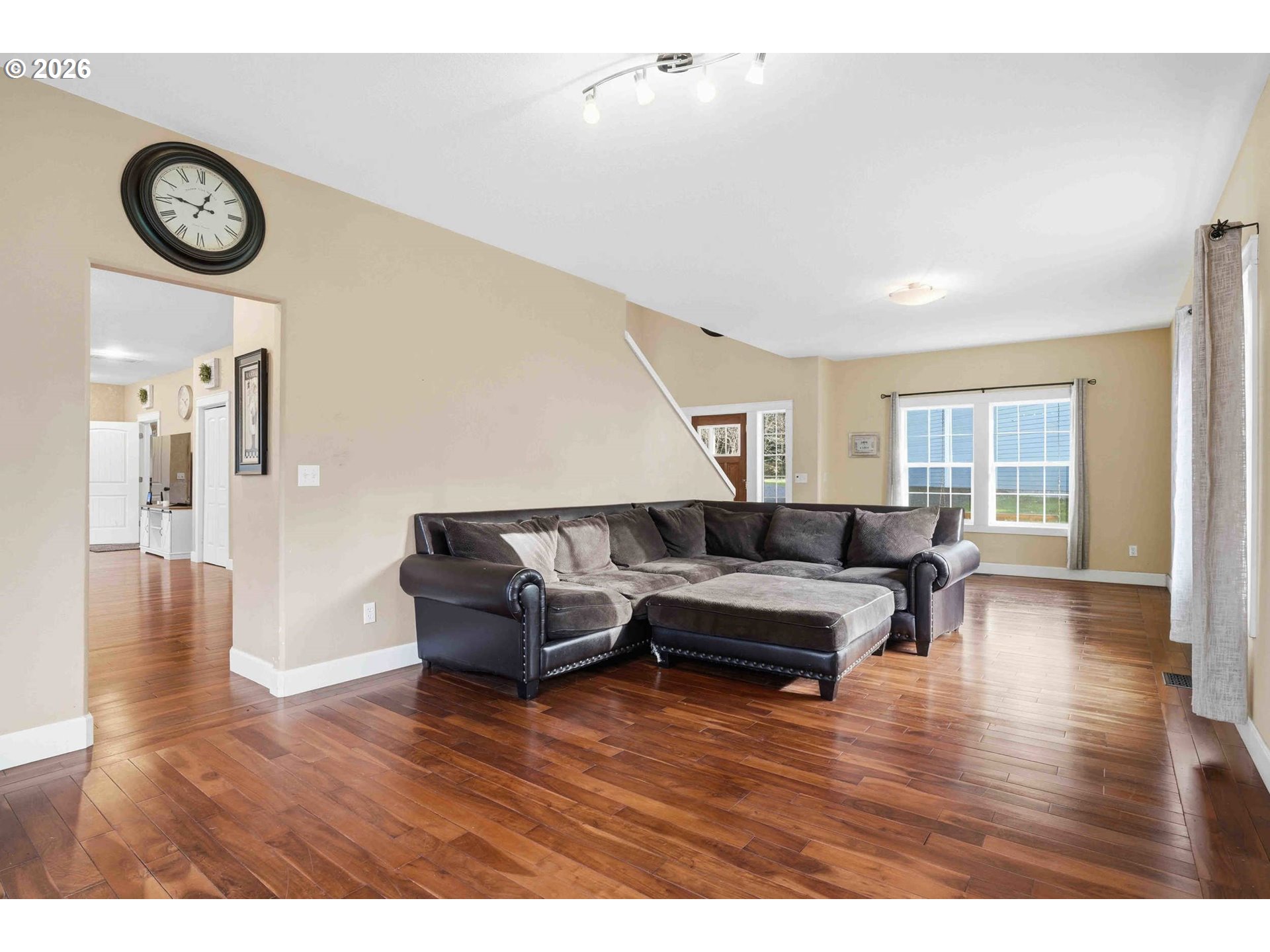 4204 Northeast Cardiel Road Washougal, WA 98671 - Photo 6 of 42 a living room with furniture and a wooden floor