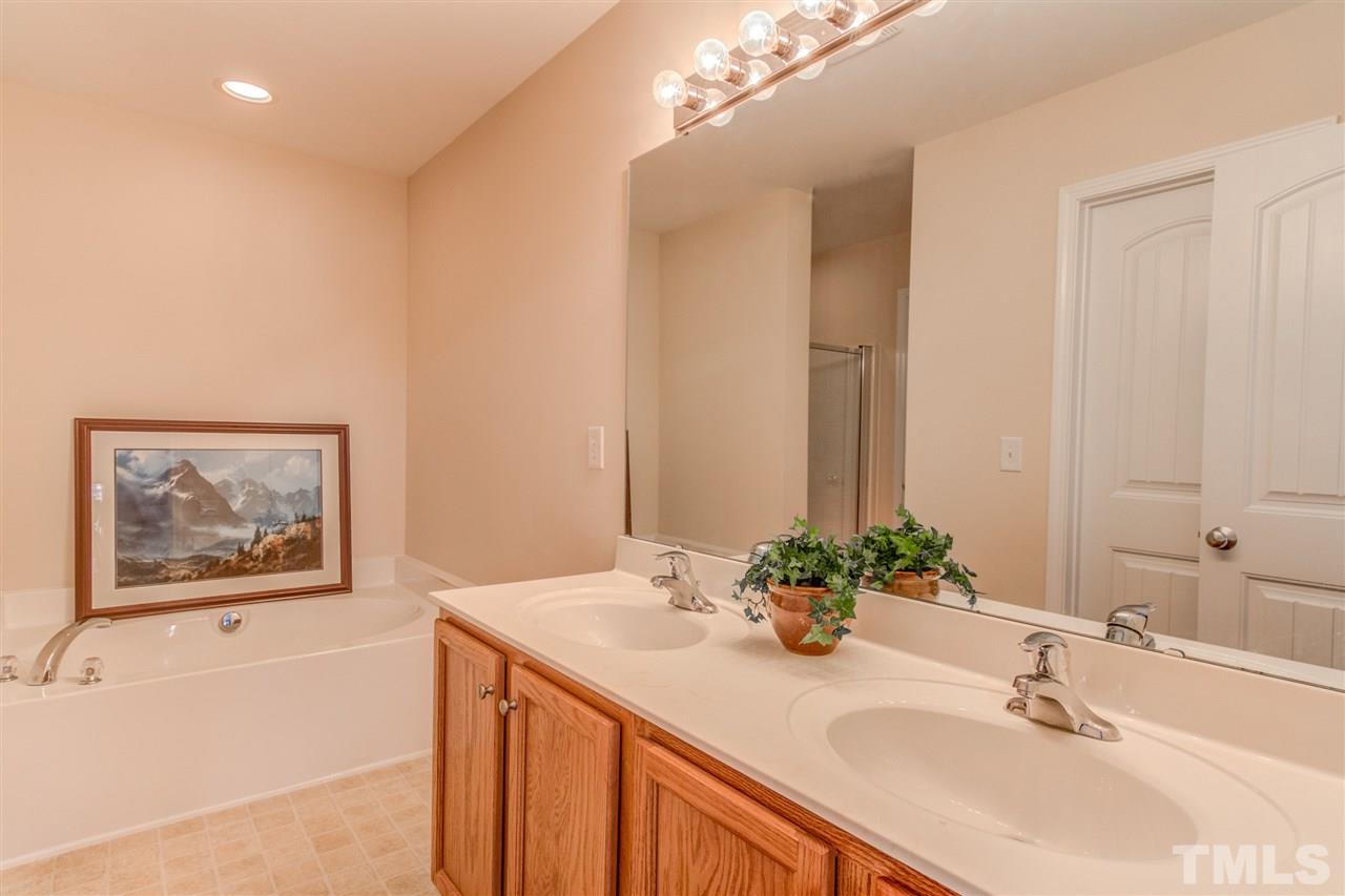 4706 Altha Street Raleigh, NC 27606 - Photo 10 of 14 Master bathroom with double sinks, garden tub and separate shower!
