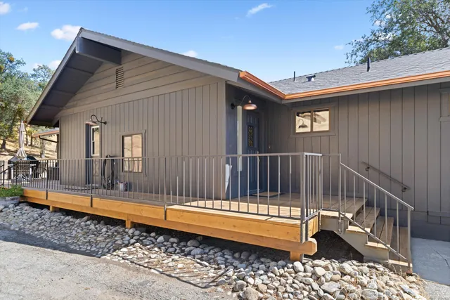 a house view with a backyard space
